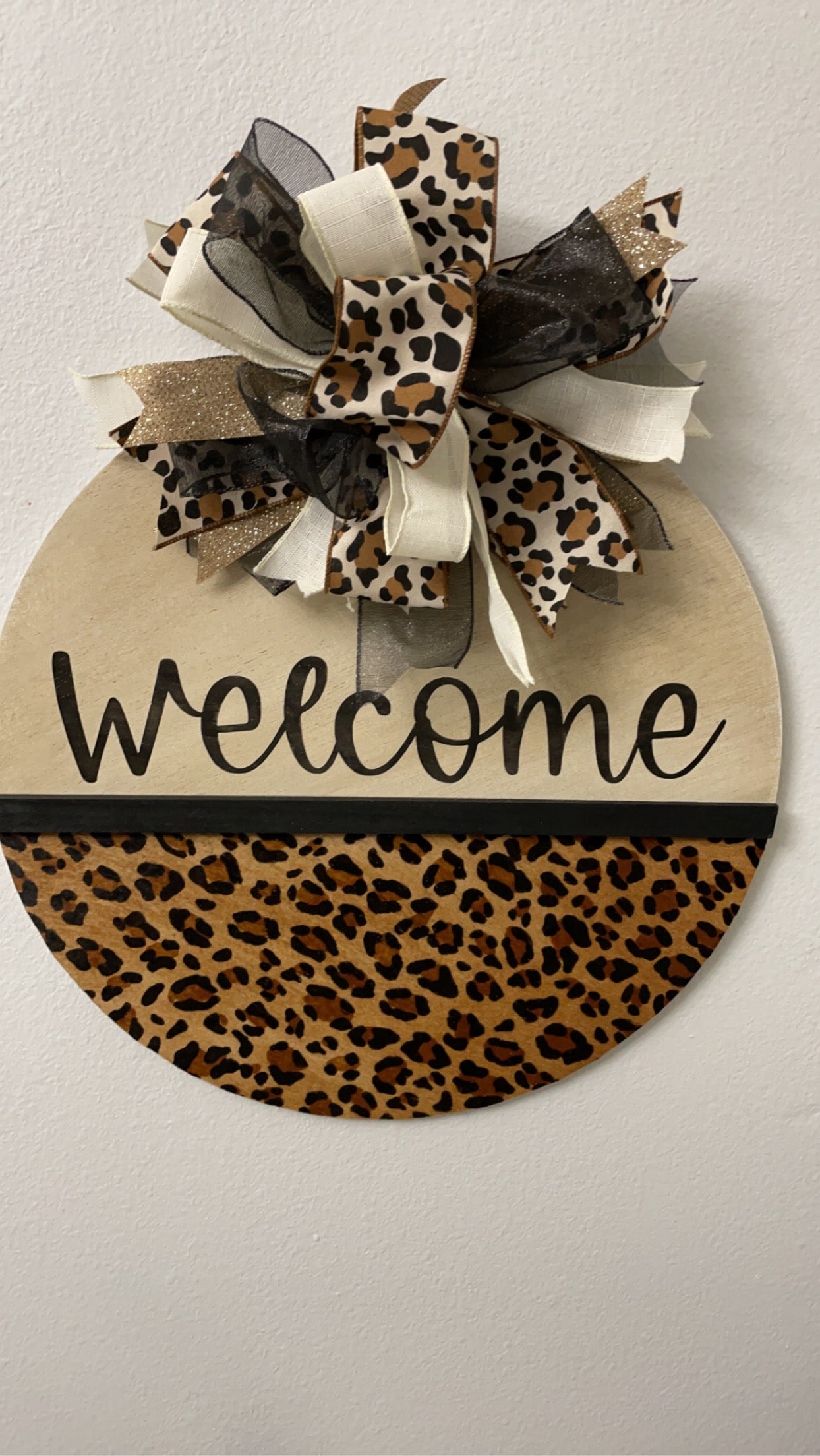 Welcome cheetah print sign
