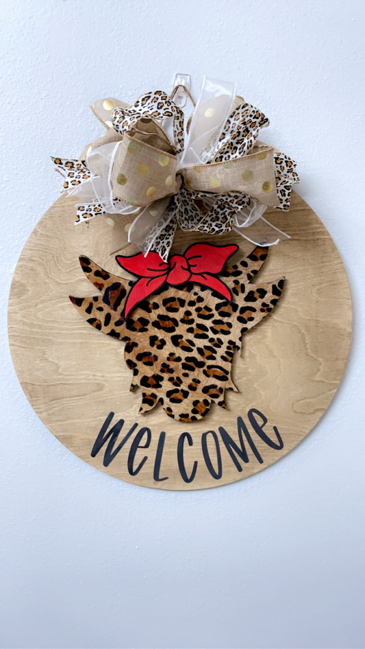 Welcome cow head cheetah print sign