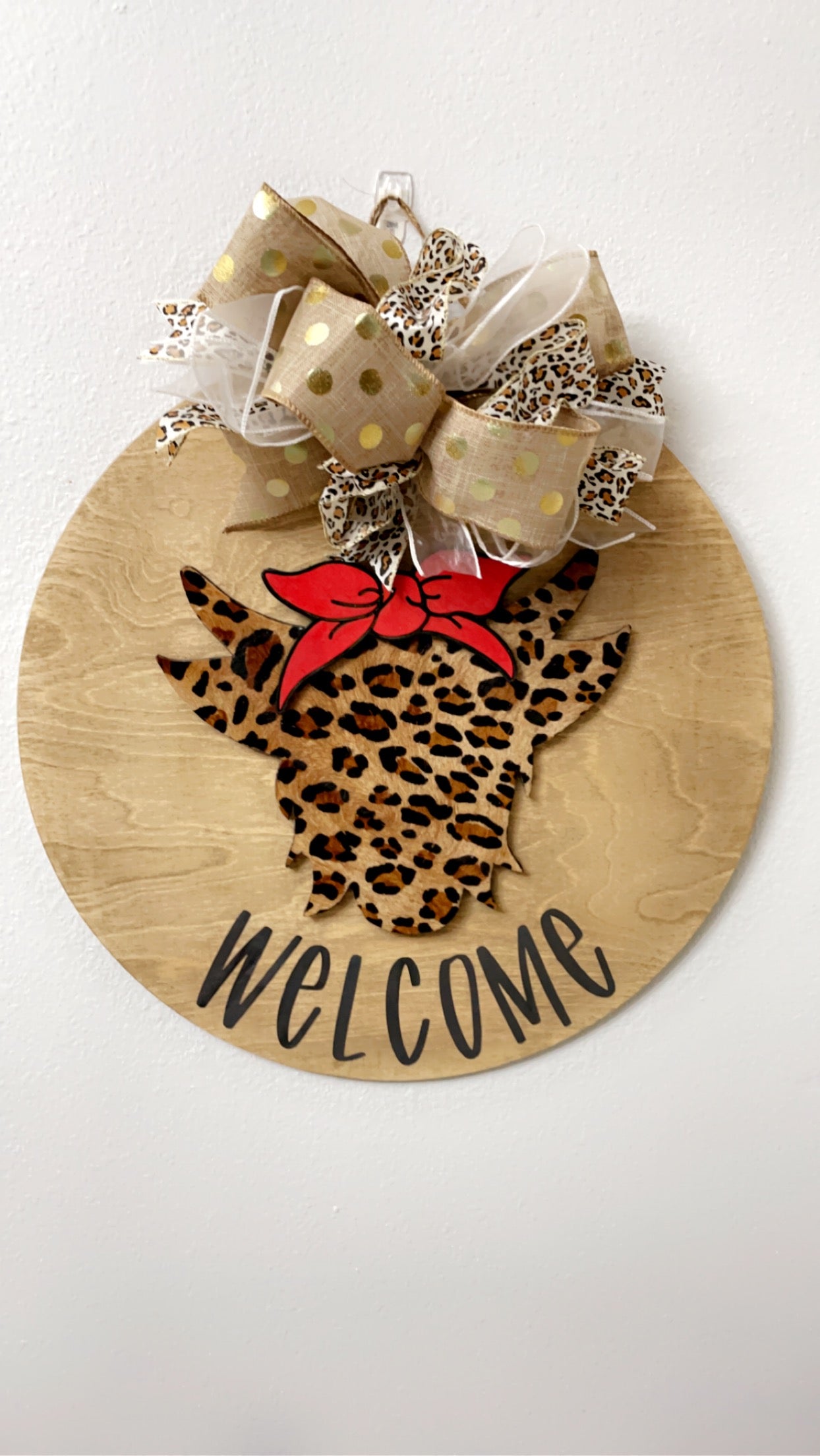 Welcome cow head cheetah print sign