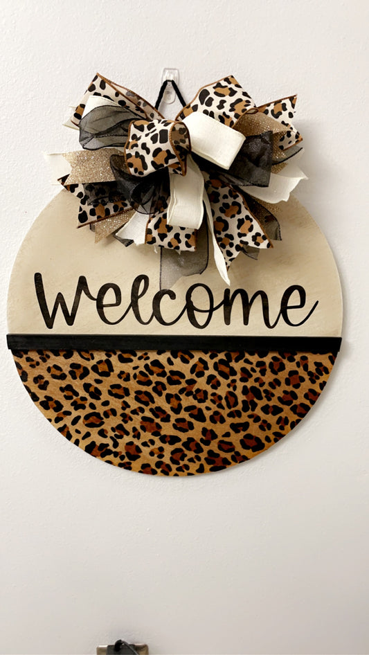 Welcome cheetah print sign