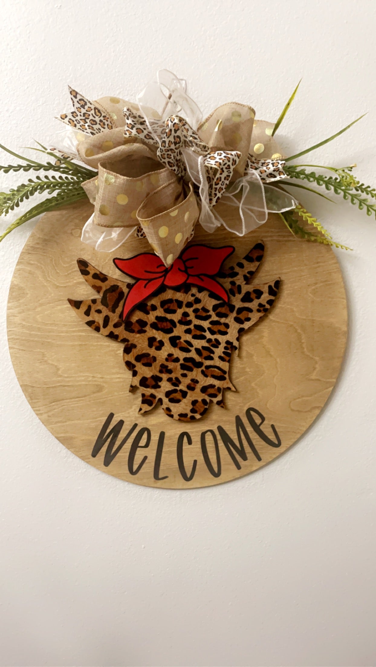 Welcome cow head cheetah print sign